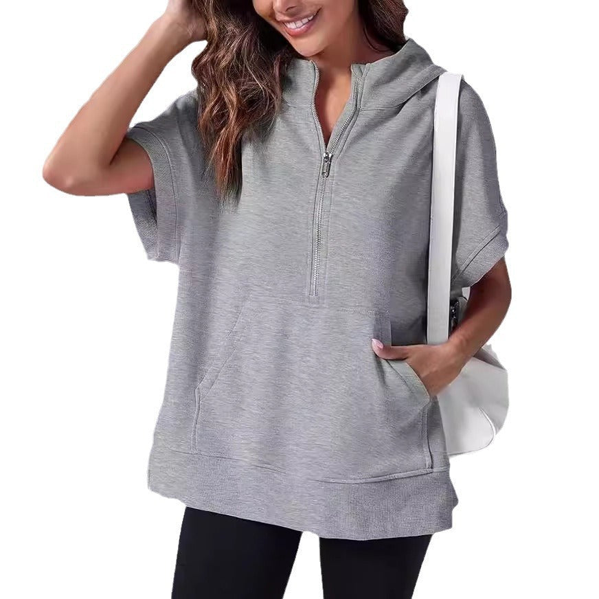 Aura – Damska bluza oversize z krótkim rękawem i kapturem
