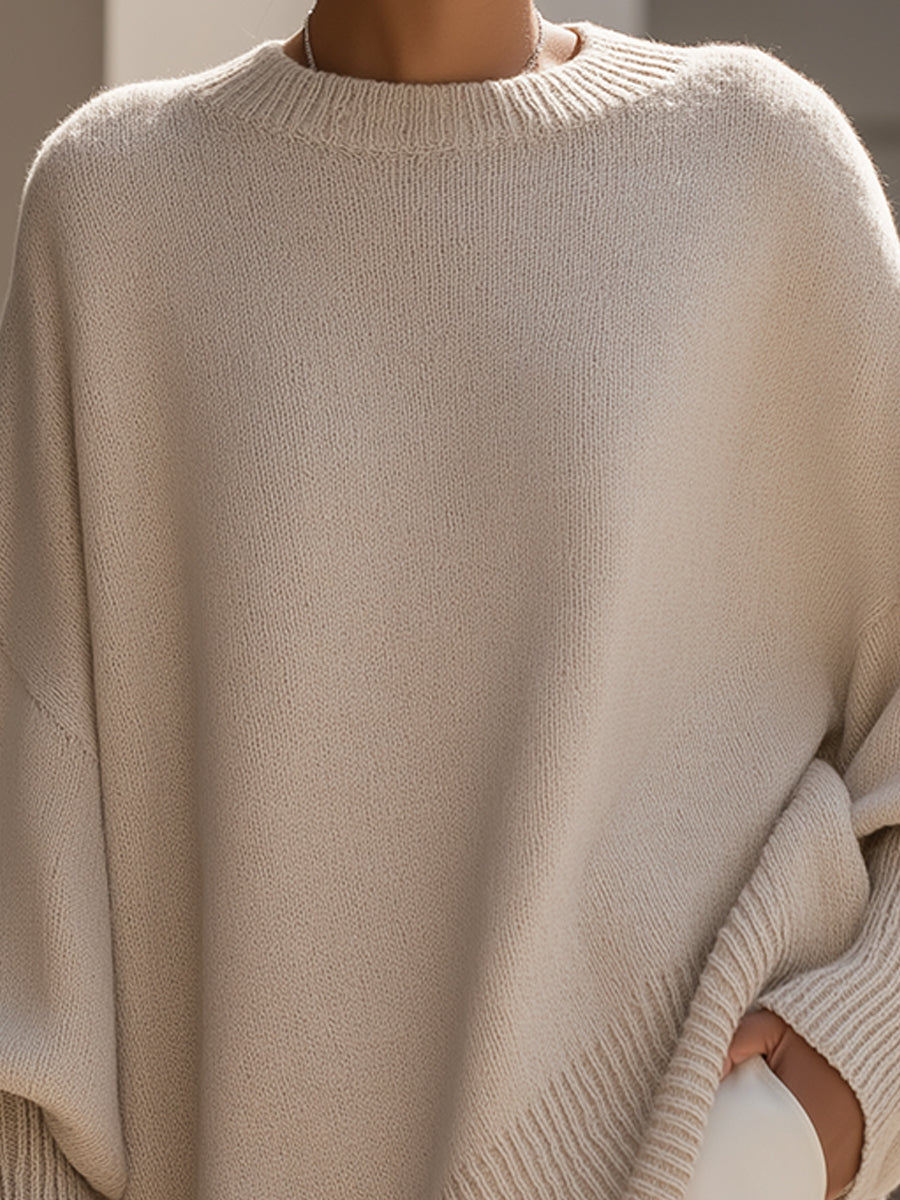 Isabella – Elegancki oversize’owy sweter asymetryczny damski