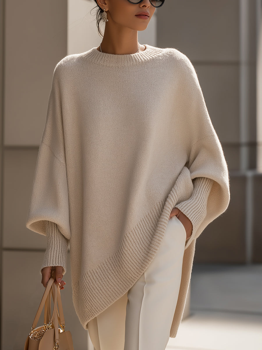 Isabella – Elegancki oversize’owy sweter asymetryczny damski