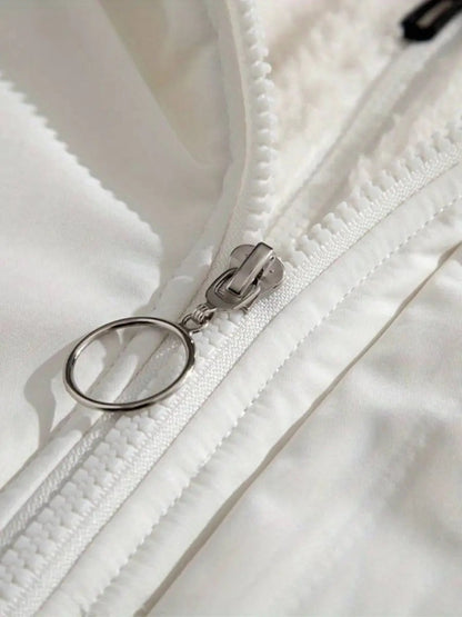 Amelia – Pikowana kurtka damska z kapturem i miękkim futerkiem