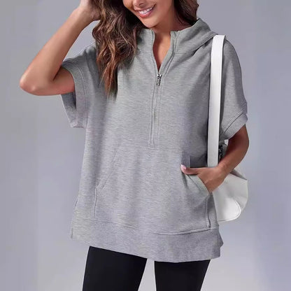 Aura – Damska bluza oversize z krótkim rękawem i kapturem
