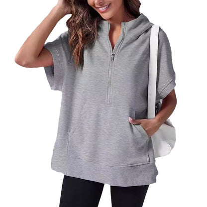 Aura – Damska bluza oversize z krótkim rękawem i kapturem
