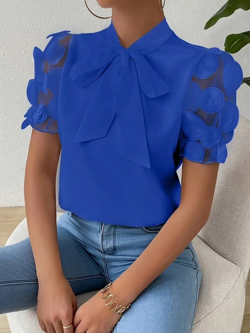 Erika – Elegancka bluzka damska z wiązaniem i ozdobnymi rękawami